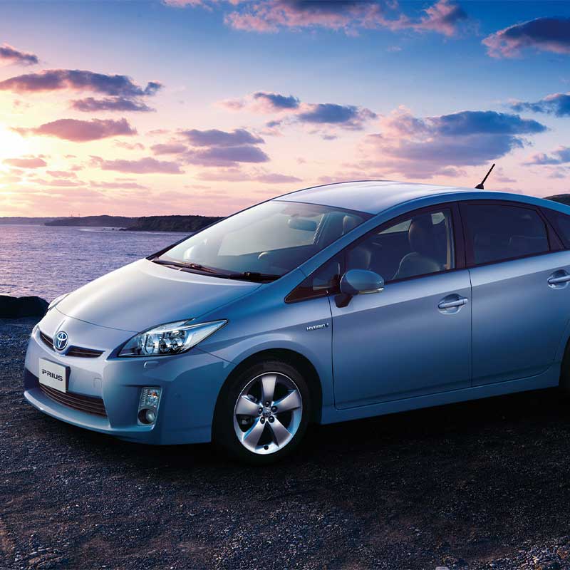 image of Prius vehicle near the beach that has been repaired by Masaki's Auto